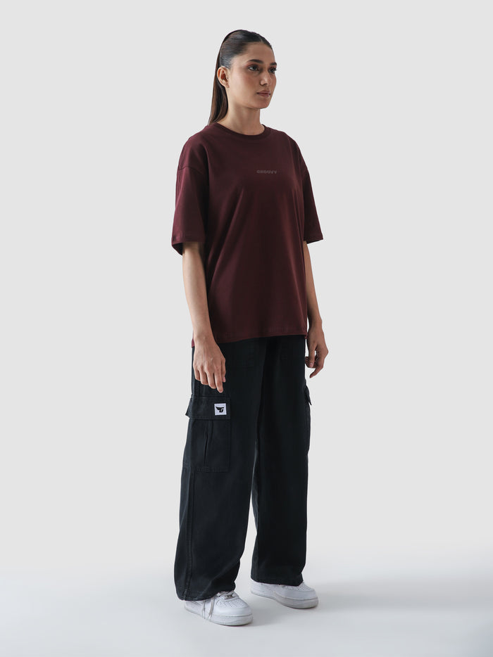 Maroon CORE tee half body lifestyle shot streetwear Pakistan – GROOVY