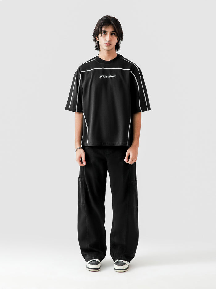 5 Way Stitch Top black oversized male model full body front view Pakistan – GROOVY