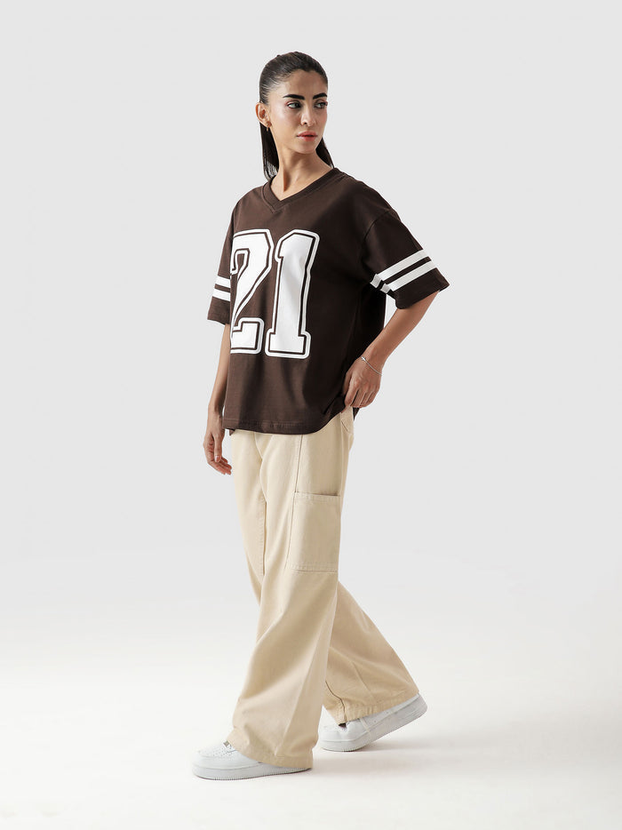 Alpha jersey mocha brown male model full body front view varsity streetwear Pakistan – GROOVY