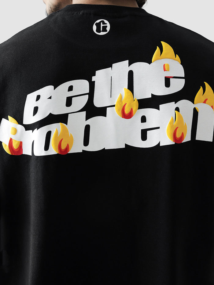 Be The Problem tee male model seated lifestyle Pakistan – GROOVY