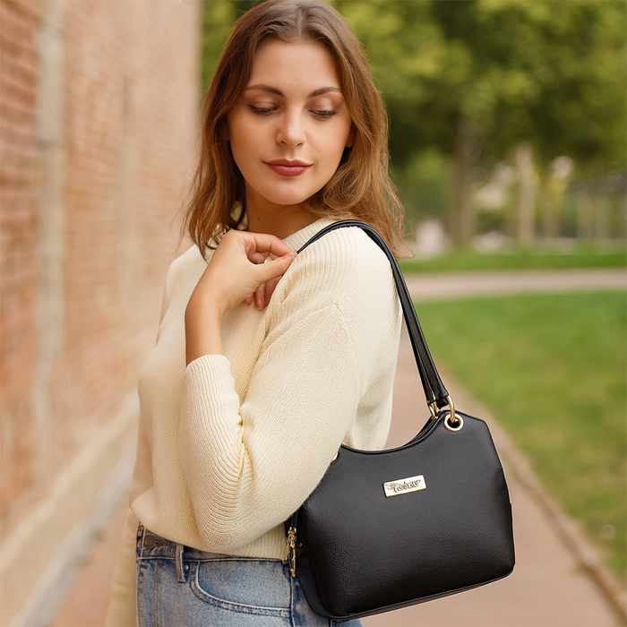 Women's black leather satchel shoulder bag for work, travel, and daily use-model image