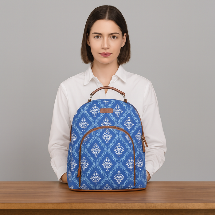 Blue printed canvas travel backpack with slim vertical silhouette for work and everyday use-model image