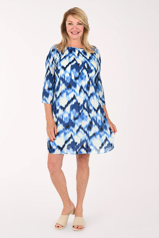 Woman wearing a multi blue dress