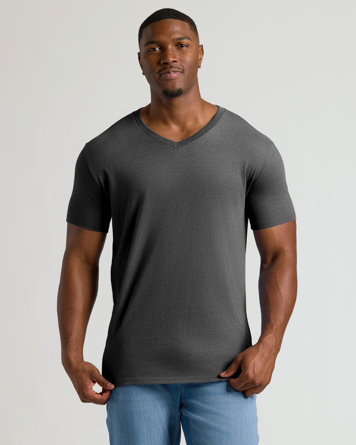 Man in Charcoal Heather Gray Tall Short Sleeve Classic V-Neck, light blue jeans.