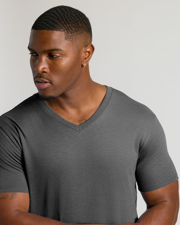 Man wearing Charcoal Heather Gray Tall Short Sleeve Classic V-Neck with tattoos.