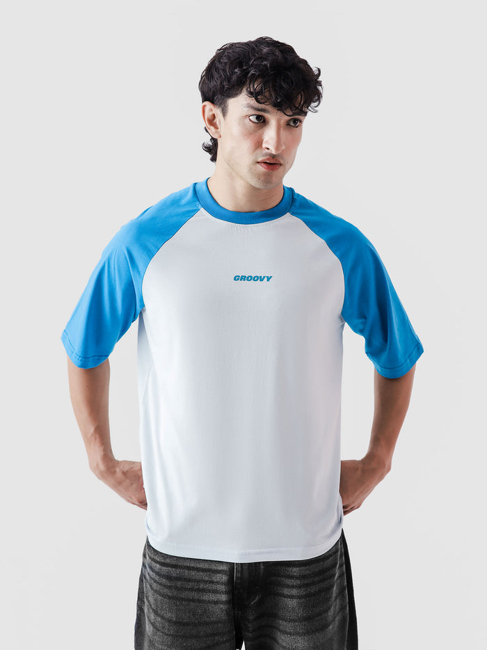 CORE tees electric blue raglan female model back view Pakistan – GROOVY