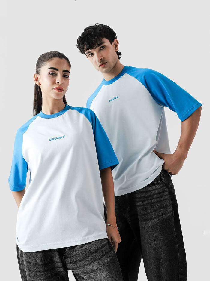 CORE tees electric blue raglan male model side angle contrast sleeve Pakistan – GROOVY