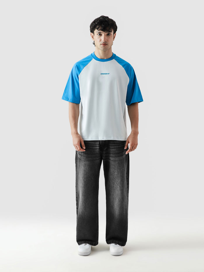 CORE tees electric blue raglan male model outdoor lifestyle Pakistan – GROOVY