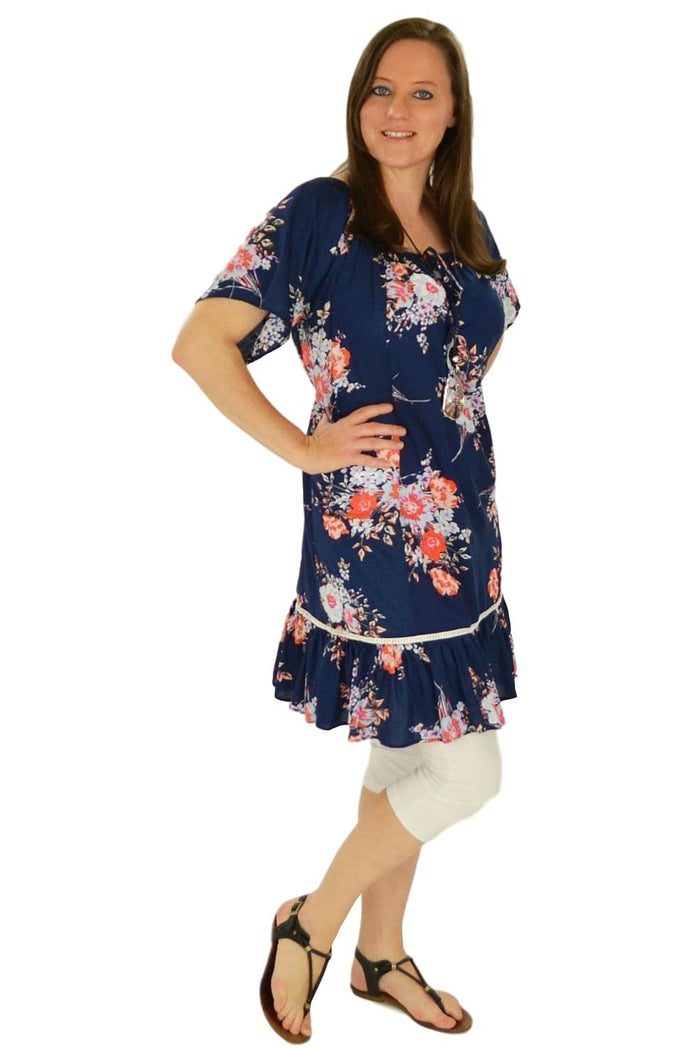 I Love Tunics Fern's Flower Tunic Top, lightweight boho-style tunic with floral pattern and relaxed fit, shown on a hanger.