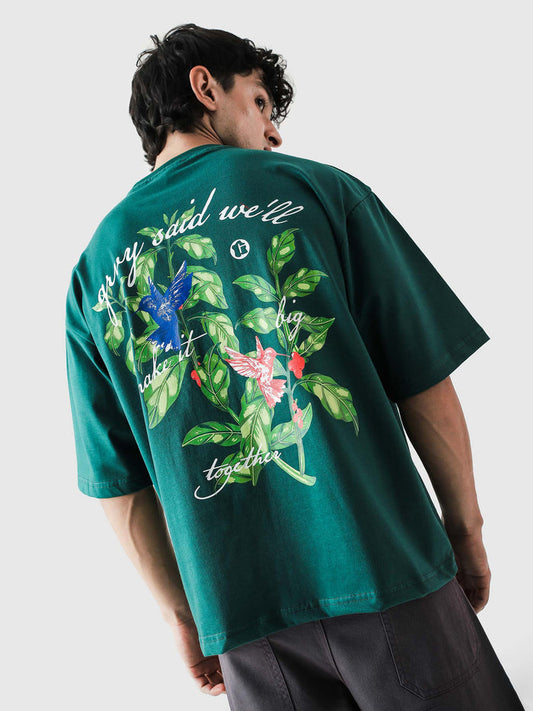 Green Hummingbird oversized tee male model outdoor lifestyle shot Pakistan – GROOVY