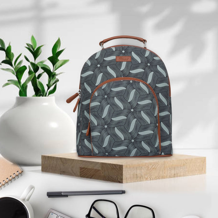 Olive green printed canvas travel backpack with slim vertical silhouette for travel and everyday use-feature image