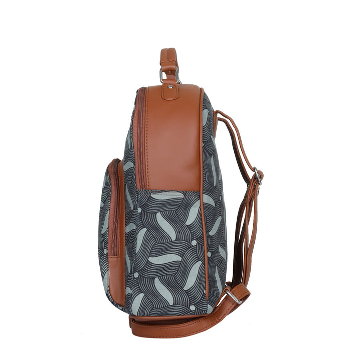 Olive green printed canvas travel backpack with slim vertical silhouette for travel and everyday use-side view