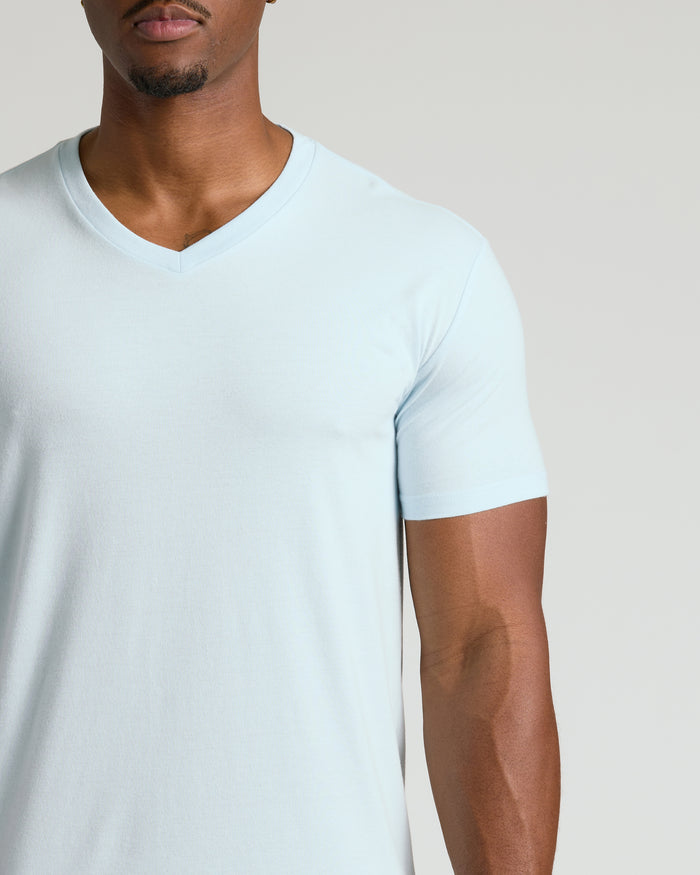 Man wearing Icicle Tall Classic V-Neck, showcasing its tailored V-neckline.