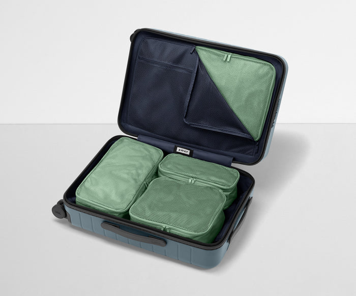 Four Insider Packing Cubes shown inside The Bigger Carry-On
//
Paired with The Bigger Carry-On.