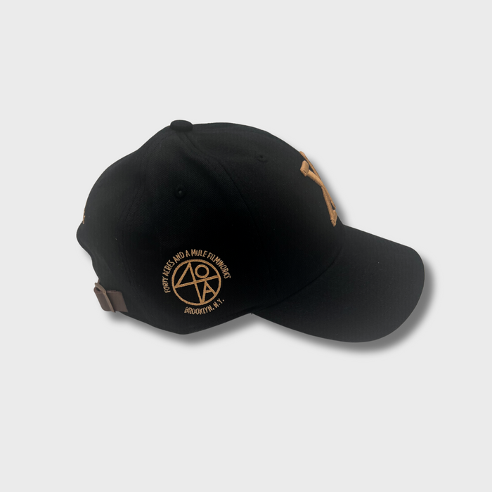 Malcolm X 100th Birthday Black & Gold Leather Strapback Dad Cap – Spike Lee's 40 Acres x Mitchell & Ness Limited Edition