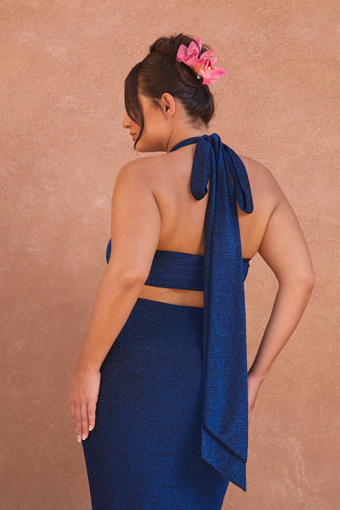 a woman in a blue dress