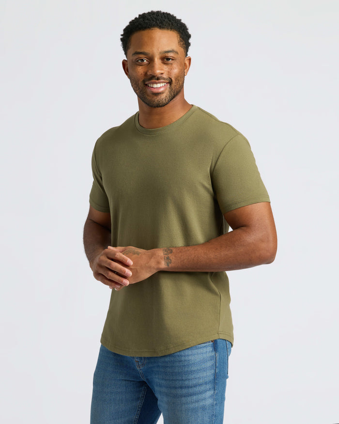 Military Green Curved Hem Classic Crew Neck modeled with blue jeans.