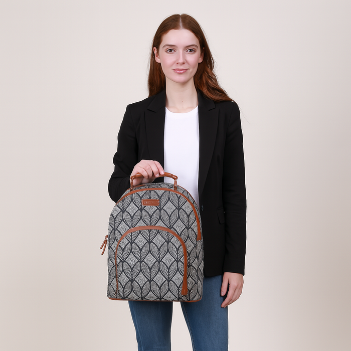 Monochrome printed canvas travel backpack with slim vertical silhouette for daily and travel use-model image