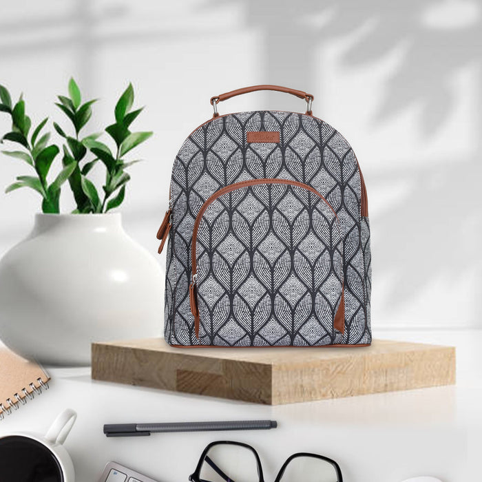 Monochrome printed canvas travel backpack with slim vertical silhouette for daily and travel use-feature view