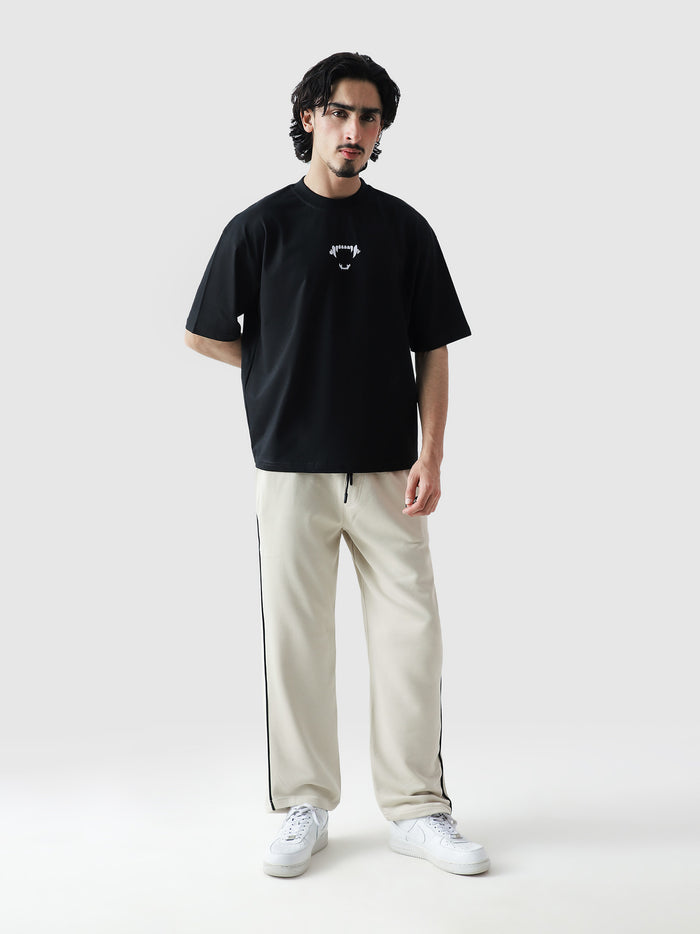 Thunder Bite Tee male model full body front view oversized Pakistan – GROOVY GRVYEffect