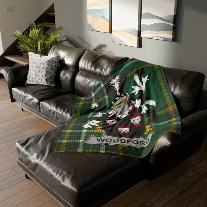 Luxurious Green Tartan Patterned Blanket with Family Crest