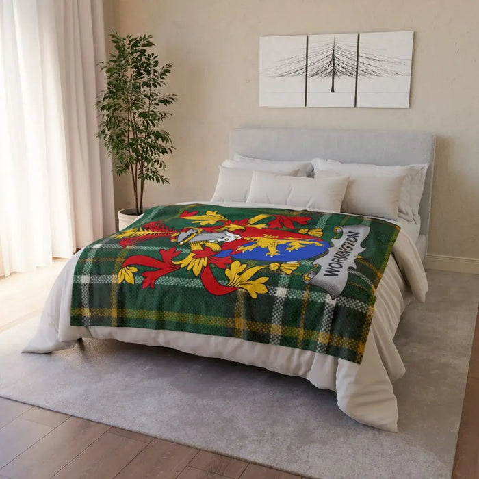 Vibrant Tartan Blanket with Ornate Family Crest Design