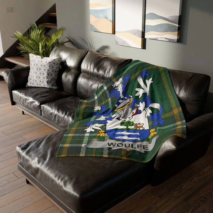 Woulfe Family Crest Blanket on a Sofa in a Living Room